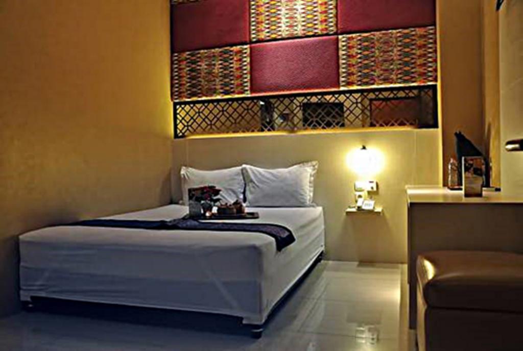 Metro House Hotel Surabaya Bilik gambar